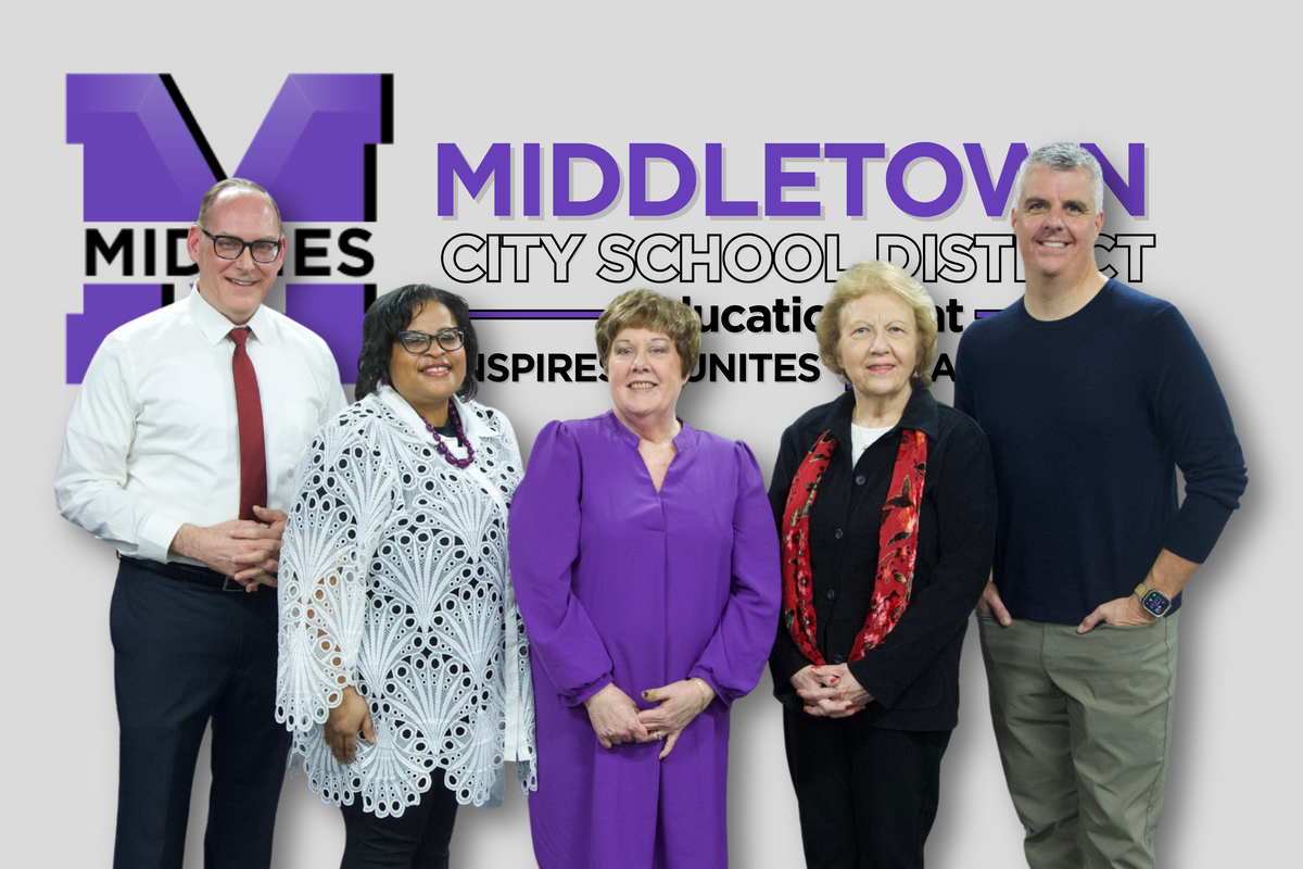 5 board members standing next to each other