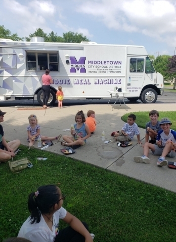 Children eating lunch outside