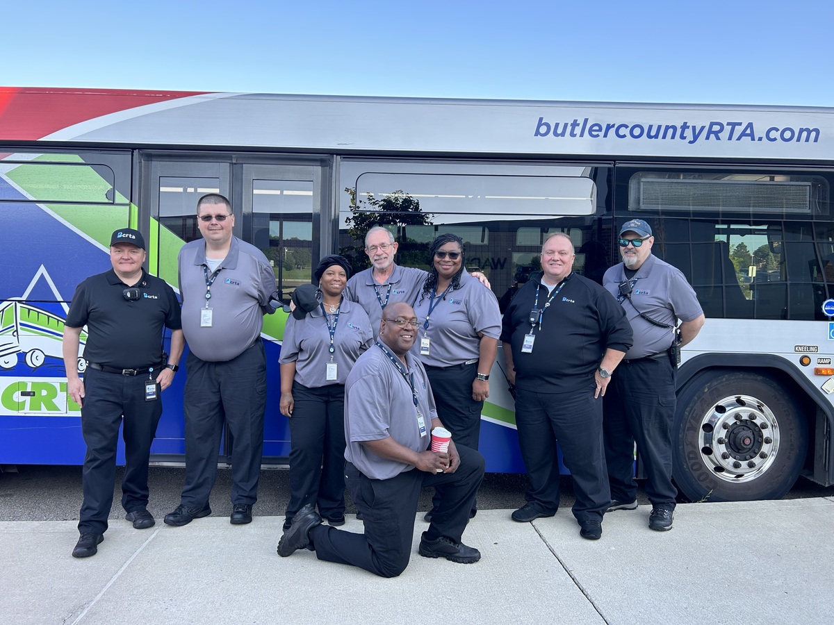 BCRTA bus drivers posed in front of bus