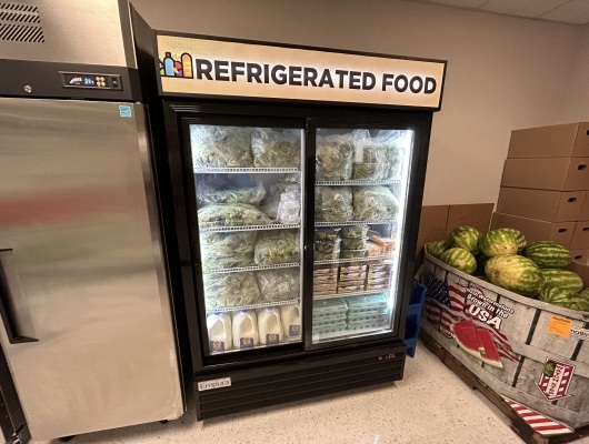 Refrigerator holds perishable items as part of food pantry