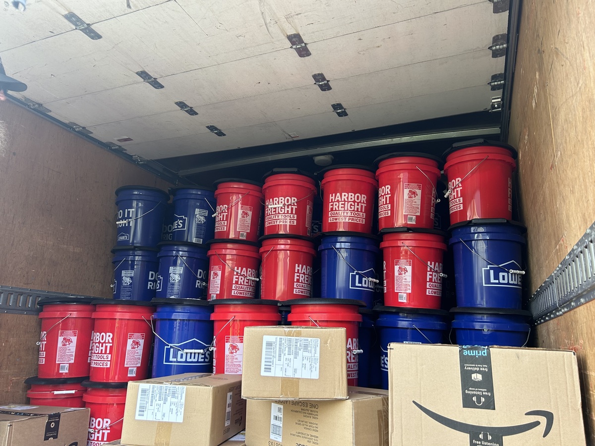 Photo shows box truck full of Barricade Buckets
