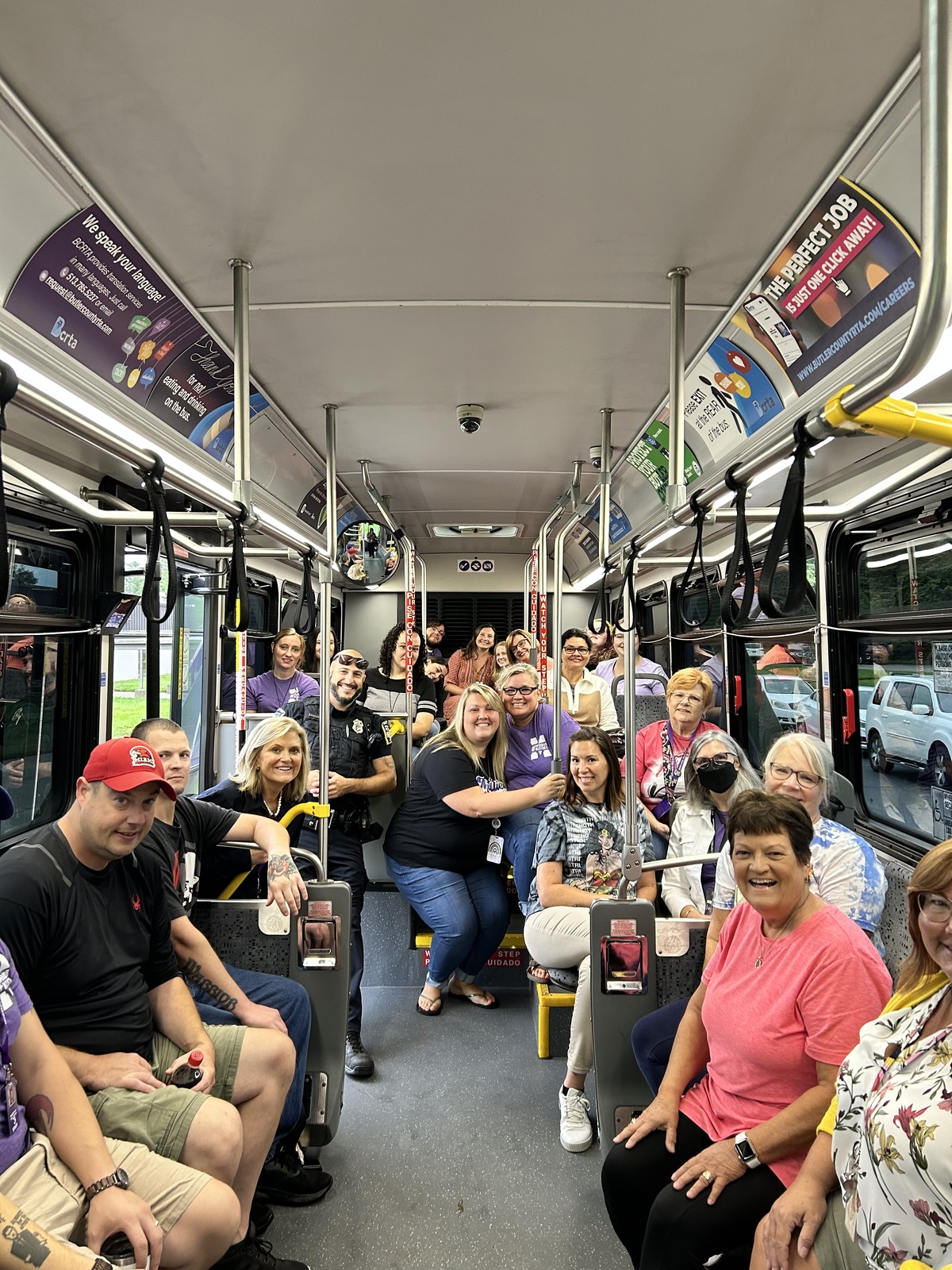 Group photo of MCSD staff on bus