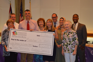 Board of Education with giant check