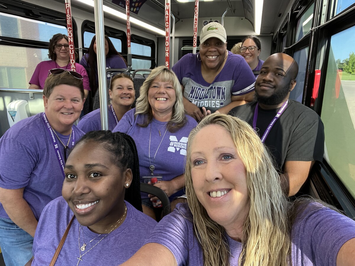 Group photo of MCSD staff on bus