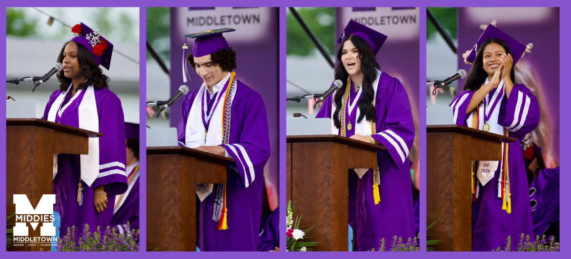 graduates at the podium