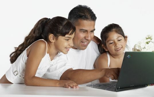 family using laptop